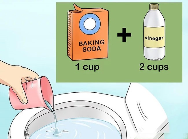 Dùng hỗn hợp baking soda và giấm để thông đường cống